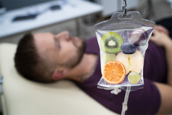 Man in an IV hydration therapy treatment.