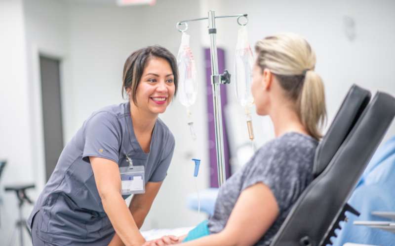 Woman at an IV hydration therapy treatment.